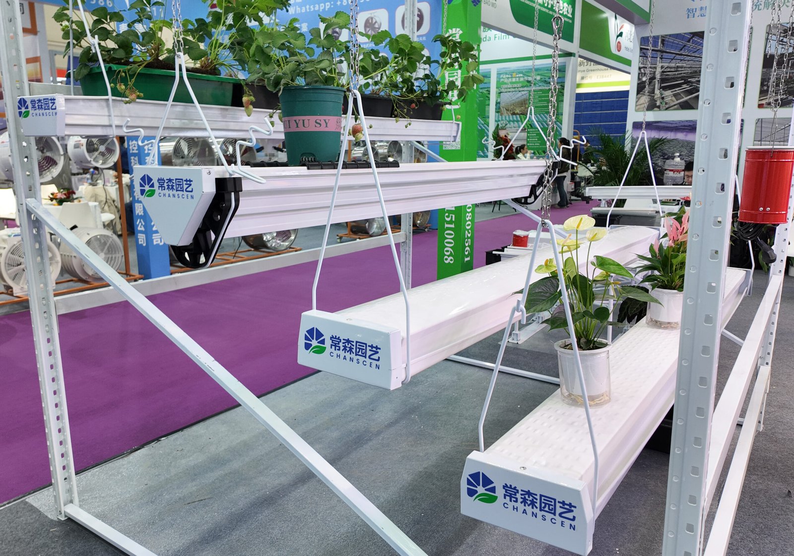 Crop support and cultivation gutter system display at exhibition